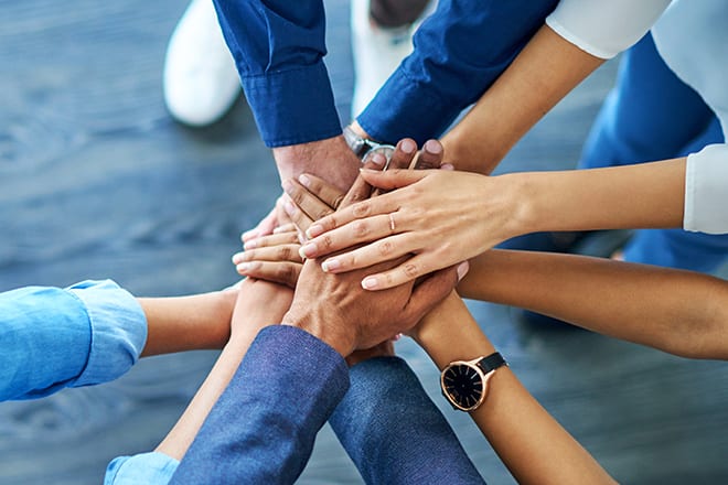 Hands together for team cheer